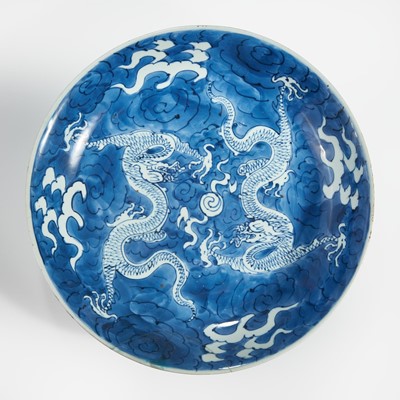 Lot 52 - A Chinese blue and white porcelain "Double-Dragon" dish