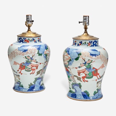 Lot 53 - A pair of large Chinese wucai-decorated porcelain jars, mounted as lamps