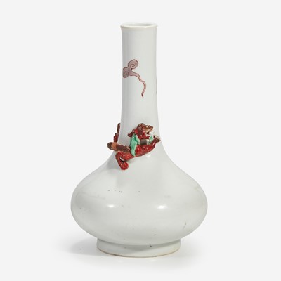 Lot 36 - A Chinese porcelain bottle vase with applied coiled dragon