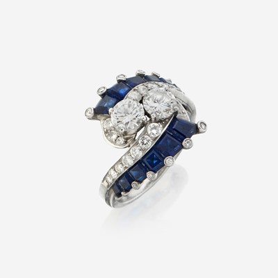 Lot 28 - A diamond, sapphire, and platinum ring