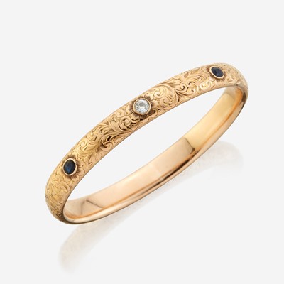 Lot 5 - An antique gold, diamond, and sapphire bangle