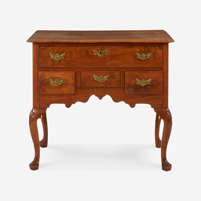 Lot 69 - A Queen Anne carved walnut dressing table