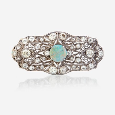 Lot 37 - An opal, diamond, and platinum pendant/brooch