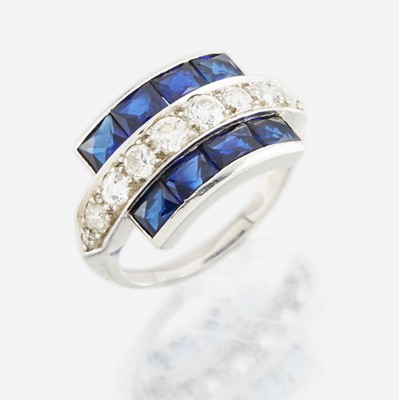 Lot 22 - A diamond, blue glass, and platinum ring