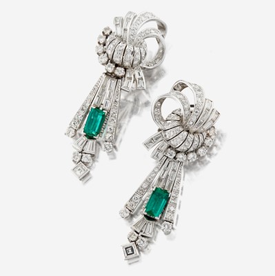 Lot 34 - A pair of diamond, emerald, and platinum day/night earrings