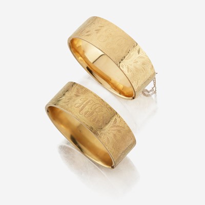 Lot 57 - A pair of gold bangles