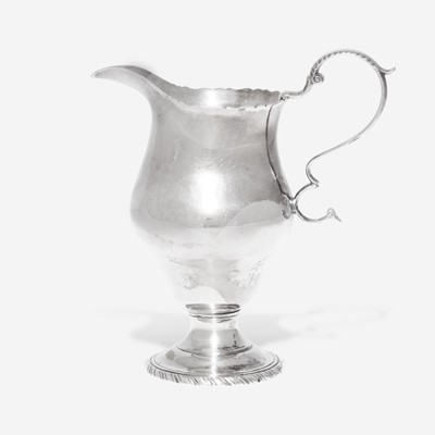 Lot 66 - A silver cream pot