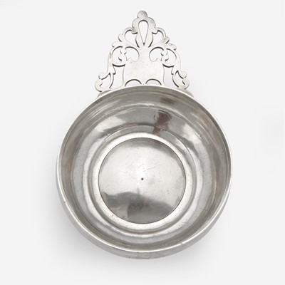 Lot 63 - A silver porringer