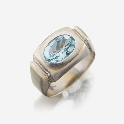 Lot 36 - A fourteen karat white gold contemporary aquamarine ring