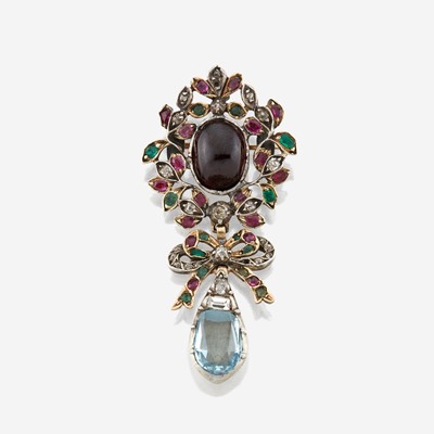 Lot 48 - A diamond and gem-set brooch