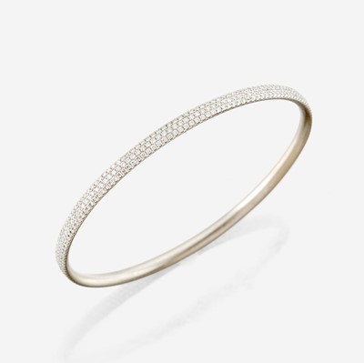 Lot 31 - A diamond and white gold bangle bracelet, Tiffany & Co.