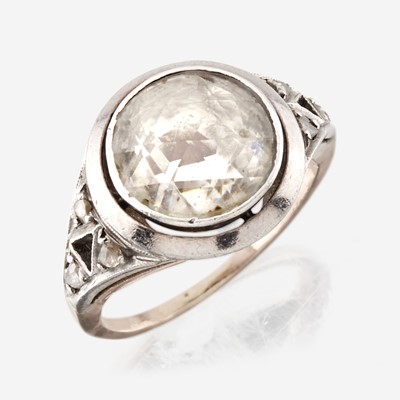 Lot 3 - A diamond, sterling silver, and gold ring