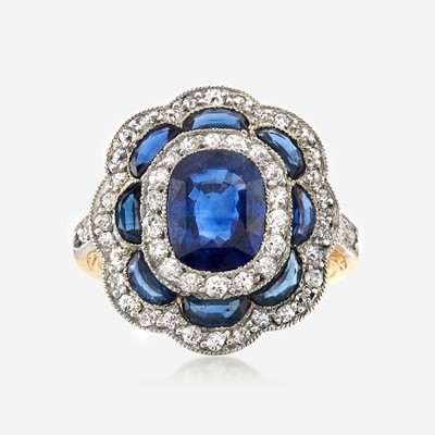 Lot 24 - A sapphire, diamond, and platinum topped gold ring