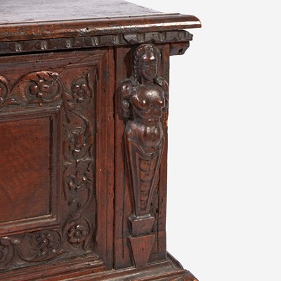 Lot 18 - An Italian Baroque Carved Walnut Cassone