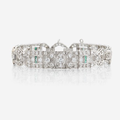 Lot 29 - An Art Deco diamond, emerald, and platinum bracelet