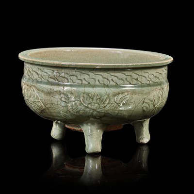 Lot 11 - A Chinese Longquan celadon tripod censer