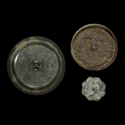 Lot 97 - Three Chinese and Japanese bronze mirrors