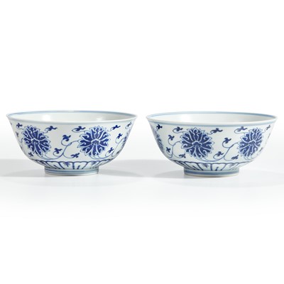 Lot 83 - An associated pair of Chinese blue and white porcelain "Lotus" bowls